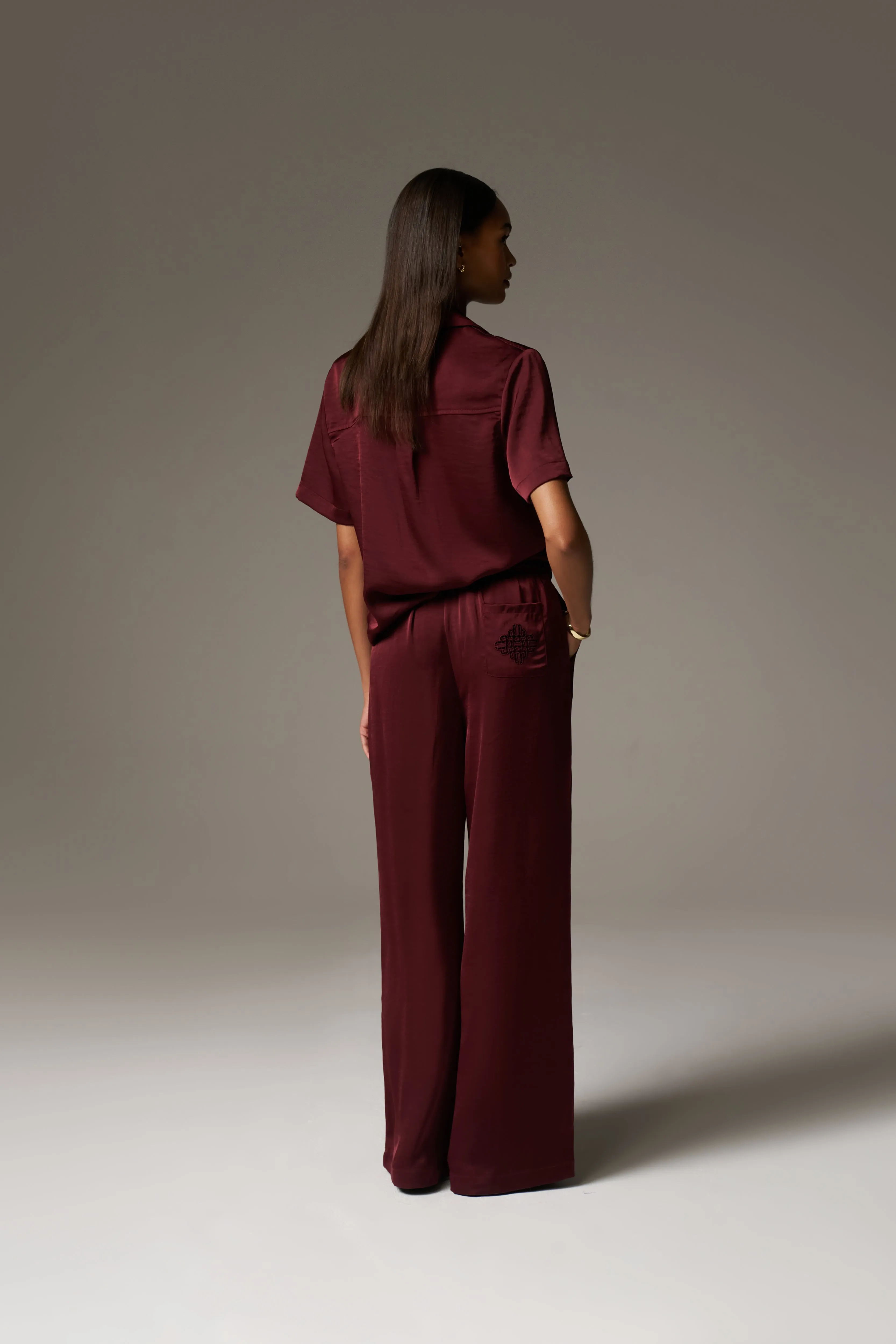 SATIN WIDE LEG EMBLEM TROUSERS - BURGUNDY